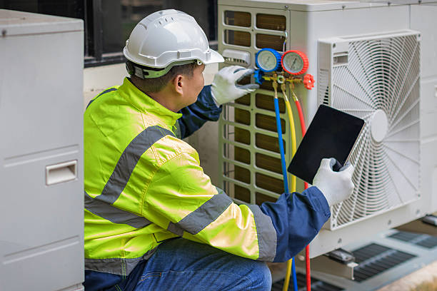 Professional Air Duct Cleaning technician working in Belmont, NC